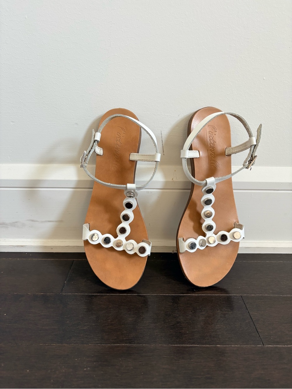L'INTERVALLE White Leather T-Strap Sandals with Studded Circle Accents